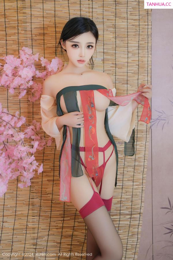   [XiuRen]高清写真图 2024.10.28 No.9351 妙可可Cheese 黑丝美腿第52张图片